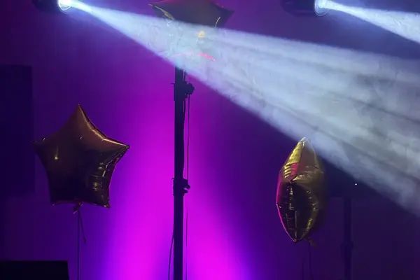 DJ equipment rental with moving head lights and sound system at a party