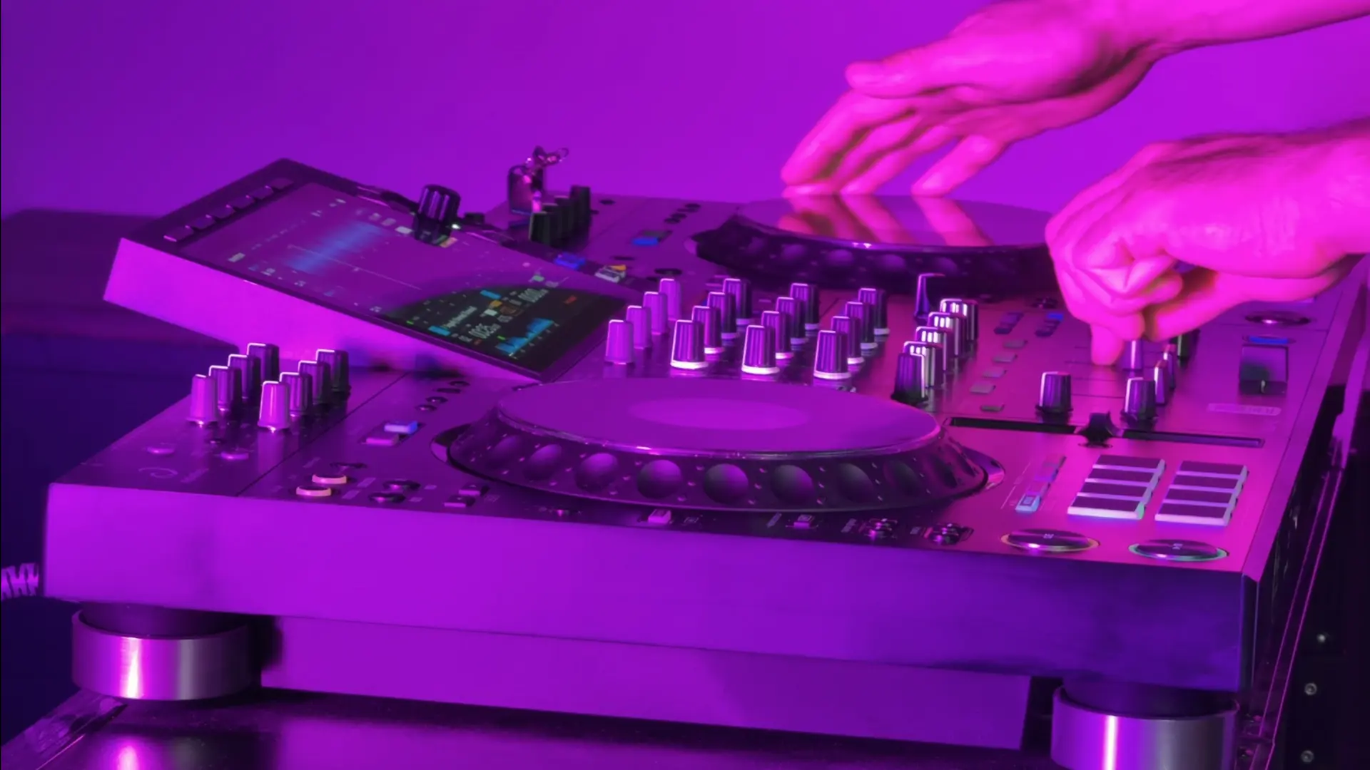 Professional DJ controller and DJ booth at a Minnesota event